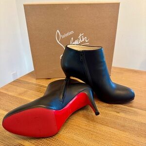 Christian Louboutin Black Heeled Boots with Red Soles